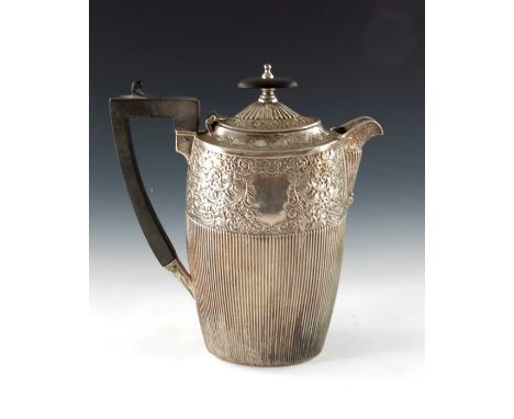 A Victorian silver water jug, James Dixon and Sons, Sheffield 1891, oval barrel form, two thirds reeded, below a foliate scro