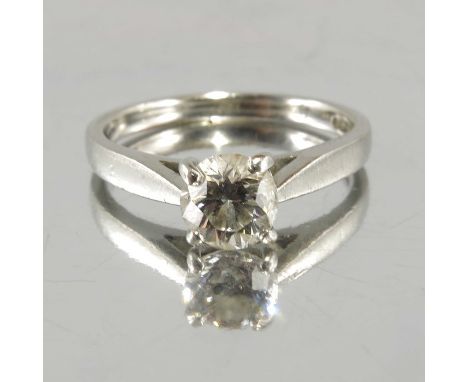 An 18 carat white gold and diamond solitaire ring, approx. 0.8 carats, size K, 4.5g