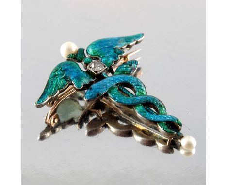 Child and Child, an Arts and Crafts enamelled Caduceus brooch, circa 1905, the blue and green turquoise guilloche enamel set 