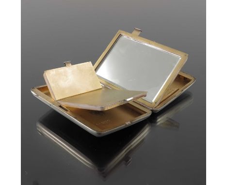 An Edwardian silver multifunctional compact card case, William Neale, Chester 1908, cushioned rectangular form, opening to re