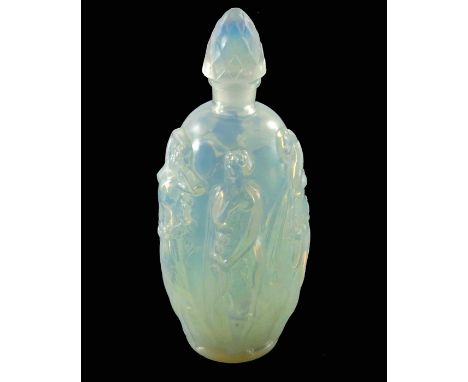 A Sabino blue opalescent glass perfume bottle, modelled with five semi nude women, pine cone finial, signed Sabino Paris, 16c