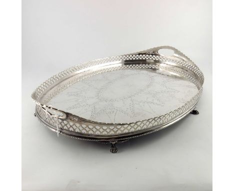A large Victorian silver plated tray, James Dixon and Sons, oval galleried form with reticulated quatrefoil trellis border an