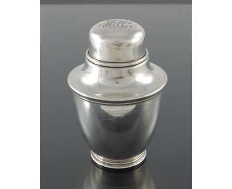 An American silver tea caddy, Towle, Newburyport, MA, circa 1930, footed shouldered beaker form with domed lid, in the Neocla