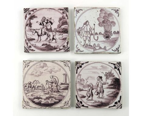 A pair of English delftware manganese tiles, each painted with allegorical scenes, 12cm x 12cm and two similar examples, 12.5