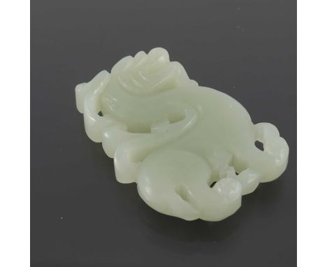 Two Chinese reticulated jade pendants, one modelled as a dragon, the other with entwined trumpet flowers, 5.5cm long (2)