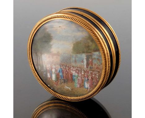 An 18th century French gold mounted tortoiseshell snuff box, the lid with a glazed painting of a village circus performance, 