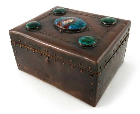 An Arts and Crafts copper and enamelled cabochon box, cuboid form, riveted and embossed to the lid with baton link border, be