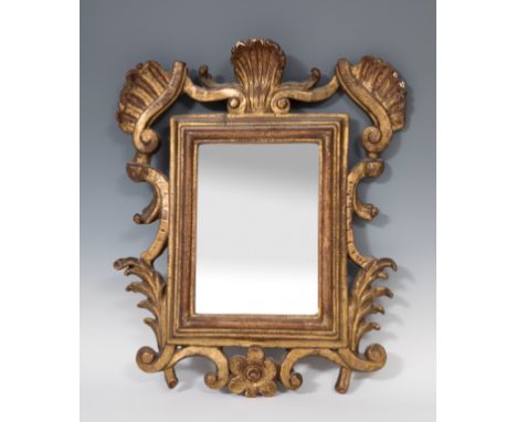 Carlos III cornucopia type mirror. Spain, mid 18th century.Carved and gilded wood.Damaged.Measurements: 28 x 20 cm (interior 