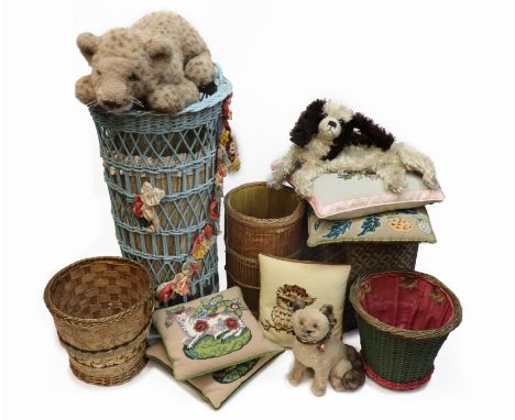 A large vintage blue painted wicker soiled linen basket, three wicker waste paper baskets, another fabric covered, five vario