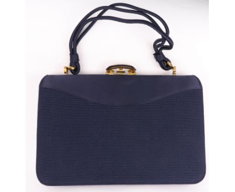 A vintage Asprey fabric handbag, circa 1960s/70s, with fitted interior, original coin pouch and mirror, 24cm wide.
