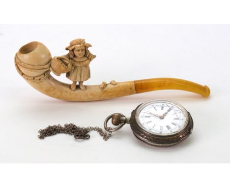 A Meerschaum pipe, late 19th/early 20th century, carved with a young girl holding a basket, amber mouth piece, 11cm wide, and