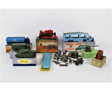 A group of boxed Dinky model vehicles, to comprise a Foden 14-ton tanker (504), with dark blue cab and light blue tank, a Bla