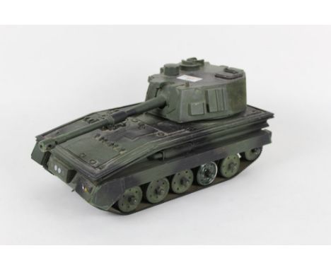 A painted model of an Abbot tank, made to display in an army recruitment window, possibly by Bassett-Lowke