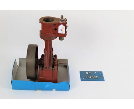 A red metal vertical stationary engine, marked 5A, and measuring 38 cm tall, together with a blue rectangular No.7 Points rai