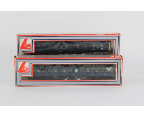 A Lima 00 gauge Class 117 DMU diesel locomotive in BR blue together with a DMU rail car, both boxed