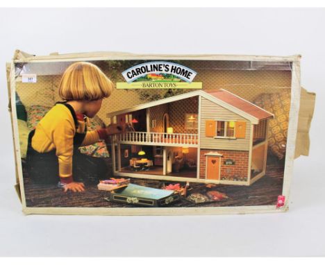 A vintage boxed Caroline's Home electric doll's house with two storeys 