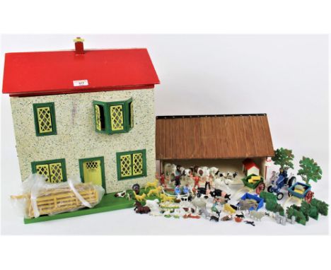 A mid 20th century painted wood and pebble dash effect two storey doll's house, with red roof, metal shutter windows, and con