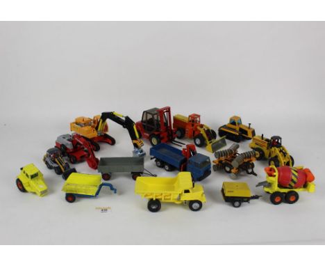 A crate of assorted diecast construction models by Dinky, Conrad, Joal, and Corgi, plus others, and three diecast constructio
