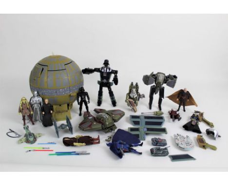 A small box of Star Wars related toys, to include Lucas Films Ltd action figures, a transformable Darth Vader figure, and a 1