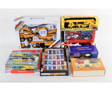 A group of boxed plastic and diecast models and toys, to include a Road Monster diecast metal construction set