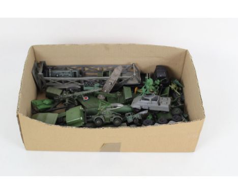 A group of military diecast models to include Dinky, Matchbox and Lonestar, together with other plastic military models, to i