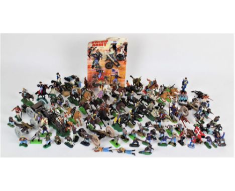 An assorted collection of plastic figures and soldiers, to include Timpo, Britain's, and Lone Star, plus a bubble packaged Un