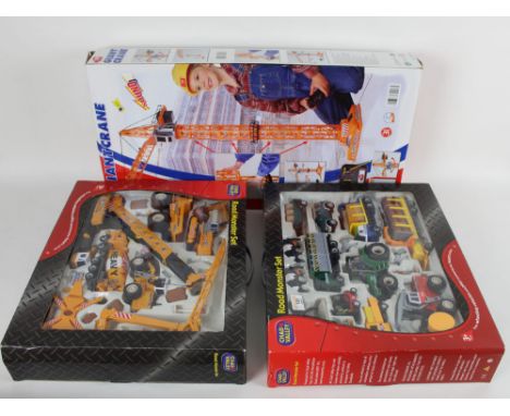 Two boxed Chad Valley Road Monster construction and agricultural sets, together with a Dicky remote control giant crane