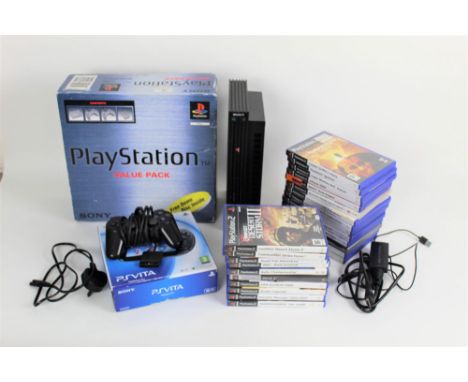 A box of Playstation games consoles, to comprise a PS Vita hand held console, a Playstation 2, and a Playstation Value Pack c