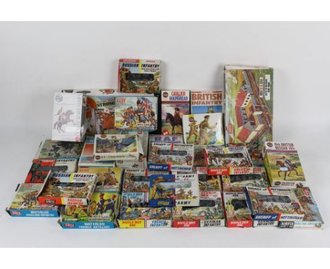 An assorted collection of Airfix model kits of military figures and buildings, some opened, and to include a Military Series 