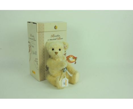 A Steiff limited edition teddy bear, "Rosalia, a musical bear", a Harrod's limited edition, 232 of 1500, having a light blond