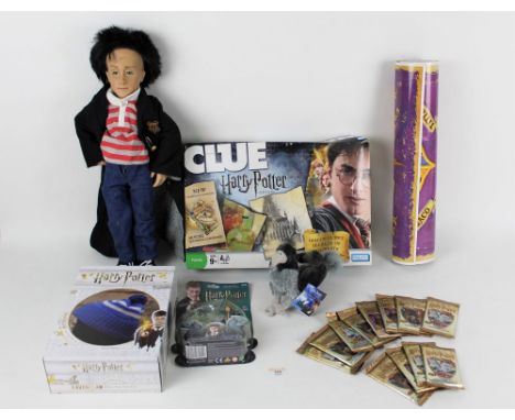 A box of Harry Potter related toys and collectables, to include a Harry Potter edition board game, a Raven Claw knit your own