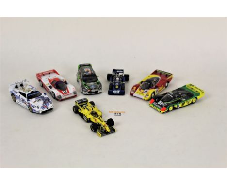 A box of 1:43 scale sports car models by Start, Brumm, Onyx, and Vitesse