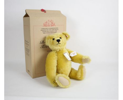 A Steiff limited edition teddy bear, "British Collector's 2001", having a brass yellow mohair covered body, chest tag, workin