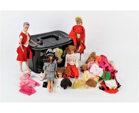 A 1960's vintage Barbie and Midge Travel Pals case, four vinyl Midge Barbie dolls, and a selection of outfits and wigs, to in