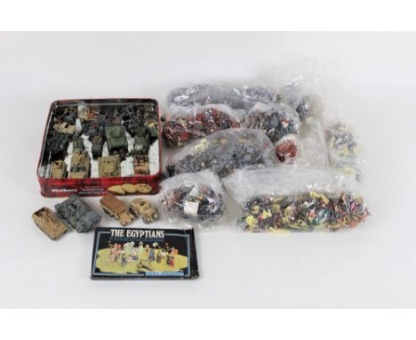 A small quantity of plastic kit built army vehicles, including tanks, and bags of miniature plastic soldiers 