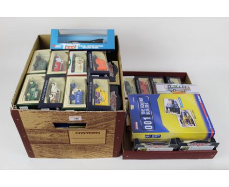 A group of 60 plus boxed diecast models and collector's sets, to include Days Gone Vanguards, a Thrust super sonic car, a US 