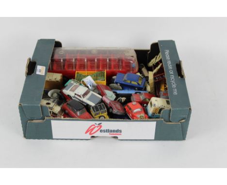 A box of Corgi and other diecast/plastic model vehicles and accessories, to include a gold coloured James Bond Aston Martini 