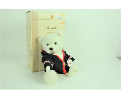 A Steiff limited edition teddy bear, "Harrod's Alexander", 341 of 1500, having white alpaca fur covered body, wearing a green