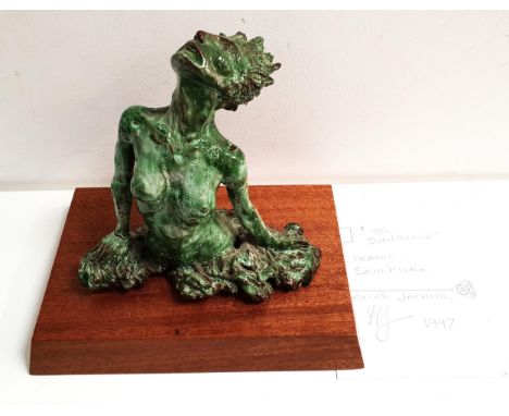 CLIVE VINCENT JACHNIKThe Sunbather, green glaze ceramic on a mahogany plinth, 22cm high 