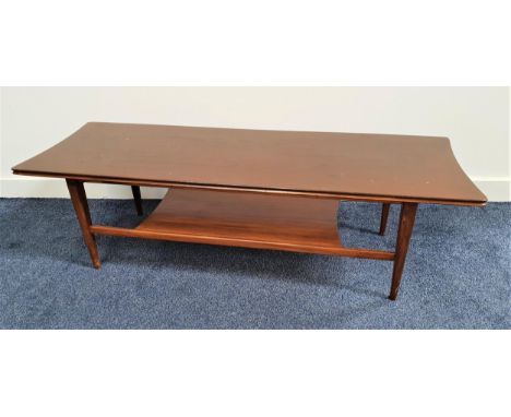 TEAK OCCASIONAL TABLEwith a shaped rectangular top and shelf below, standing on tapering supports, 35.5cm x 121cm 