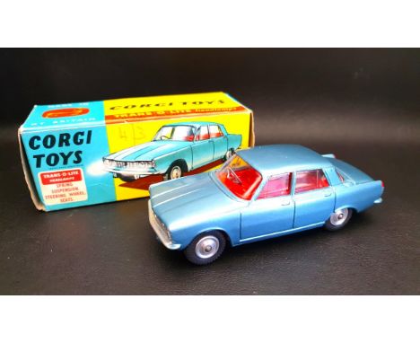 CORGI TOYS No. 252 ROVER 2000 with blue body and red interior, spring suspension, Trans o Lite headlamps, fitted with spun hu