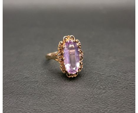 AMETHYST SINGLE STONE RINGon unmarked gold shank, the oval cut amethyst measuring approximately 13mm x7.5mm x 4.4mm, ring siz