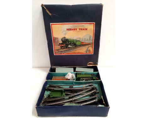 HORNBY MECCANO O GAUGE 501 PASSENGER SETcomprising an 1842 clockwork engine and tender, two 3113 LNER carriages, LNER guard w