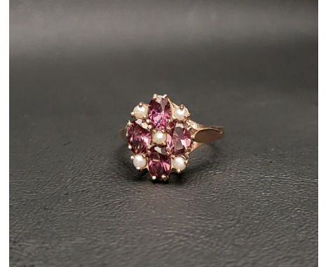 RHODOLITE AND SEED PEARL CLUSTER RINGthe four oval cut rhodolites interspersed with five seed pearls, on a nine carat rose go