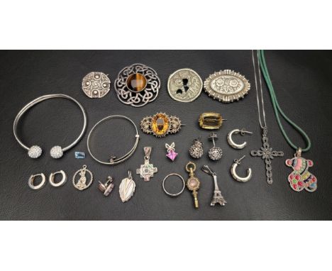 SELECTION OF MOSTLY SILVER JEWELLERYincluding two silver Celtic knot decorated brooches, one with central tiger's eye; two pa