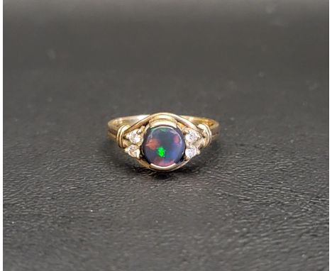 OPAL TRIPLET AND DIAMOND RINGthe central opal triplet flanked by two diamonds to each side, in all approximately 0.15cts, on 