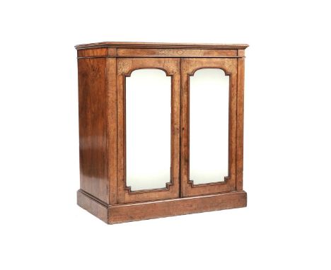 A Victorian walnut mirror-fronted chiffonier, having a rectangular top with a moulded edge, over the marquetry decorated and 