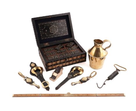 An early 20th Century Anglo-Indian porcupine quill box, the hinged lid opening to reveal nine lidded storage areas with lift-