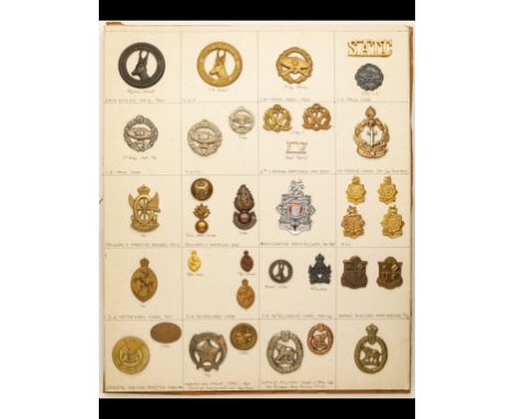 Insignia of various South African Departments, Corps and Regiments  A card bearing metal cap and collar-badges of the Union D