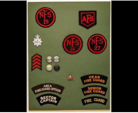 Red Cross, Police and Fire Service Insignia A card bearing a KC  metal cap badge and 4 buttons of the National Fire Service; 